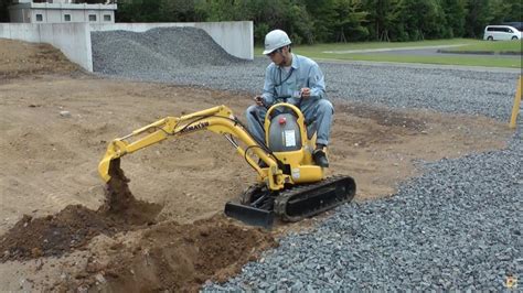 house for mini excavator|stand behind mini excavator.